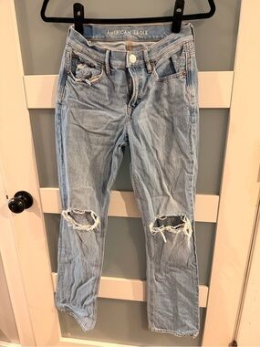 American Eagle Outfitters light blue ripped straight leg jeans